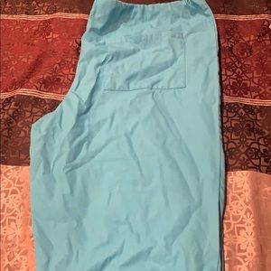 Long coral colored scrub pants